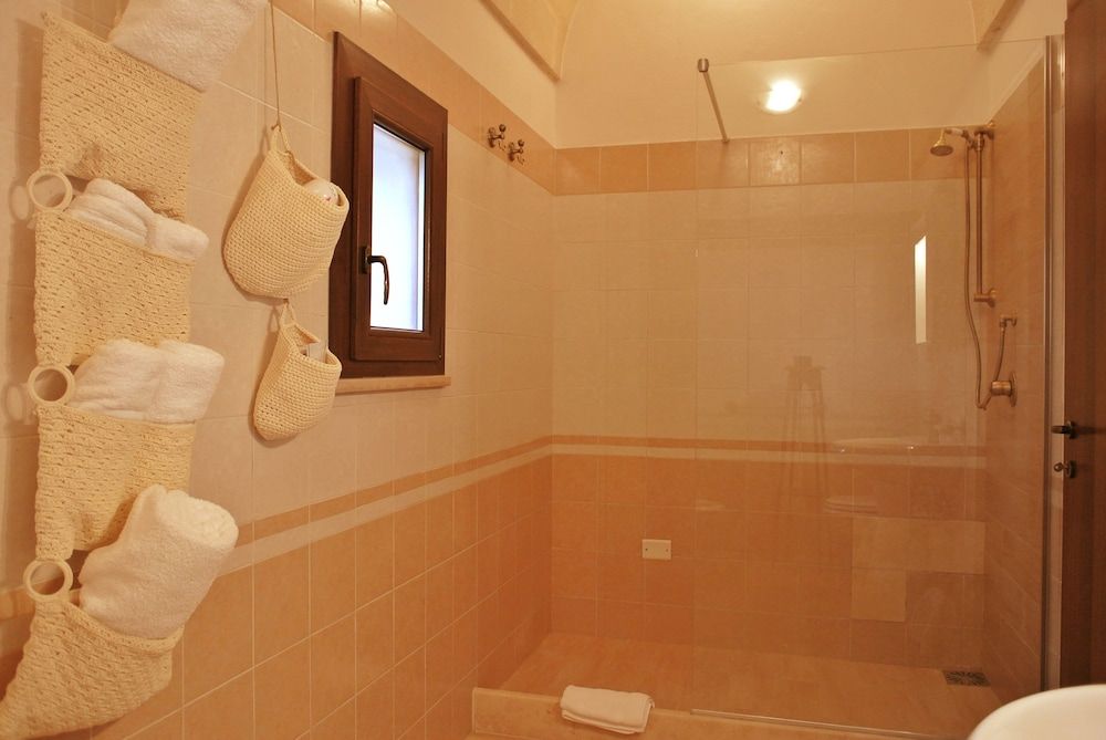 Agriturismo Masseria Nuova Quadruple Room, Refrigerator, Garden View 7