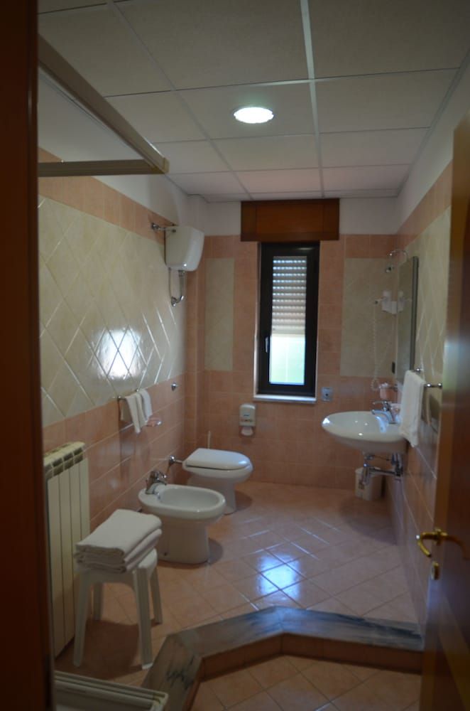 Hotel Toscano Quadruple Room 4