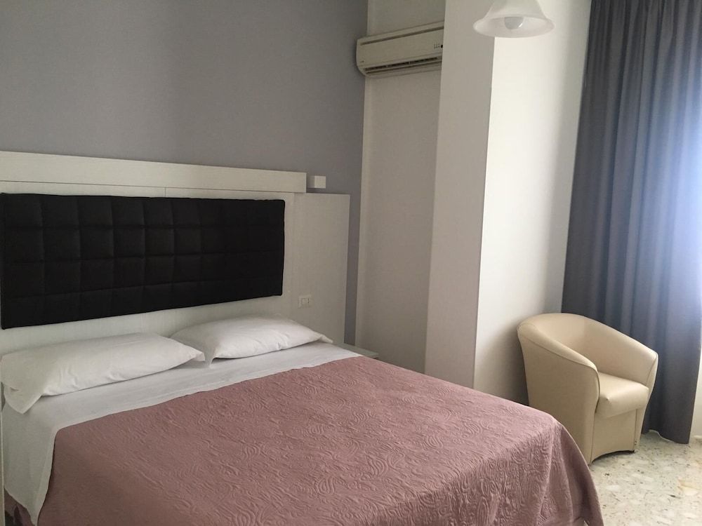 Piccolo Hotel Quadruple Room