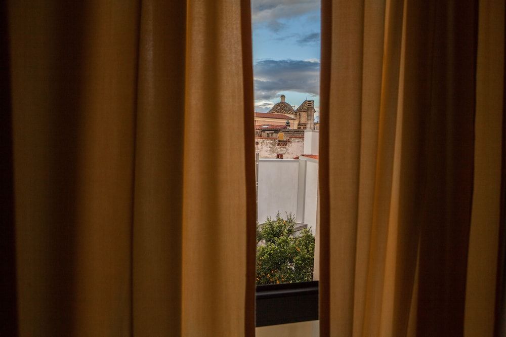 Hotel Duomo Quadruple Room 4