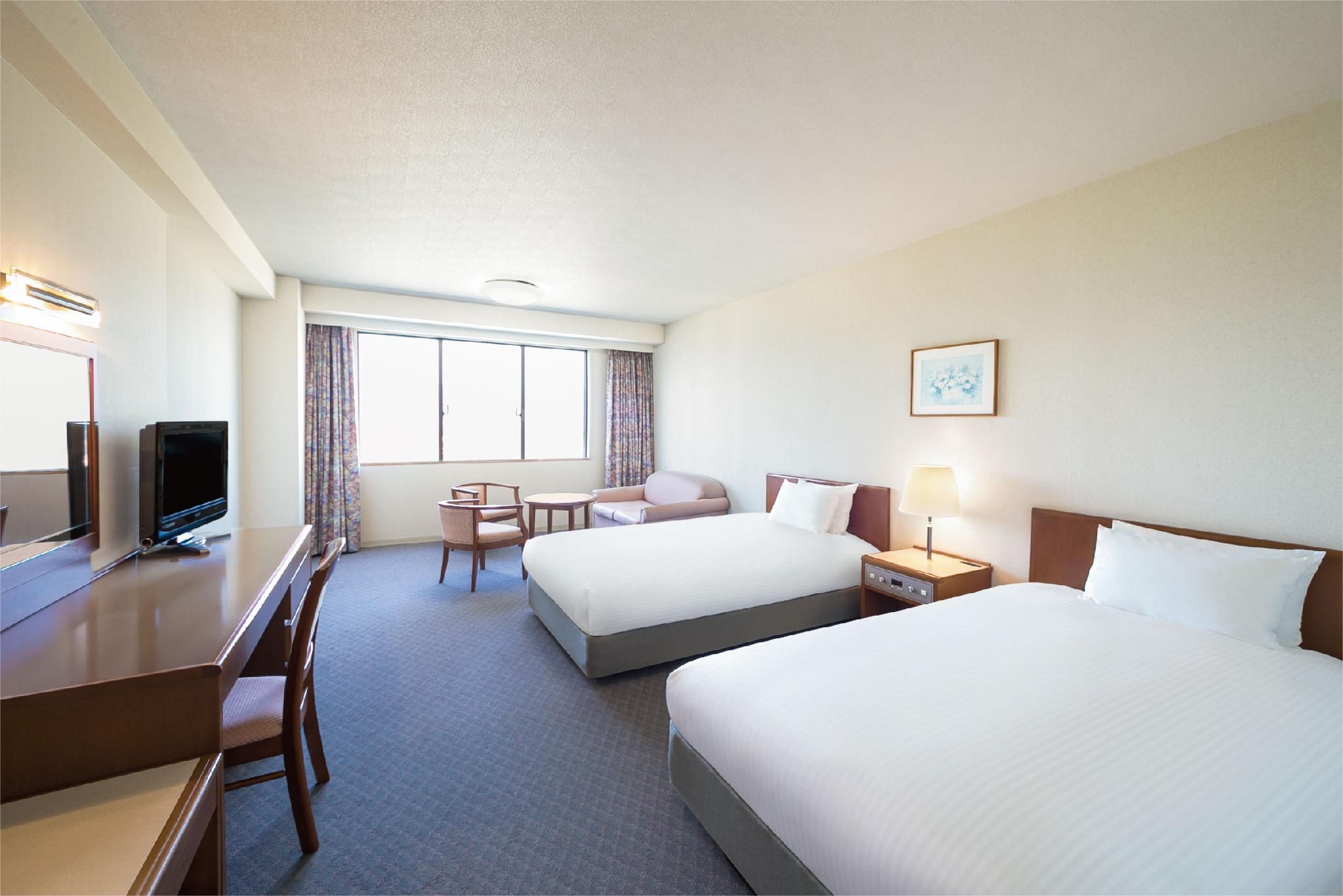 Classic Room with 2 single beds and 2 sofa beds