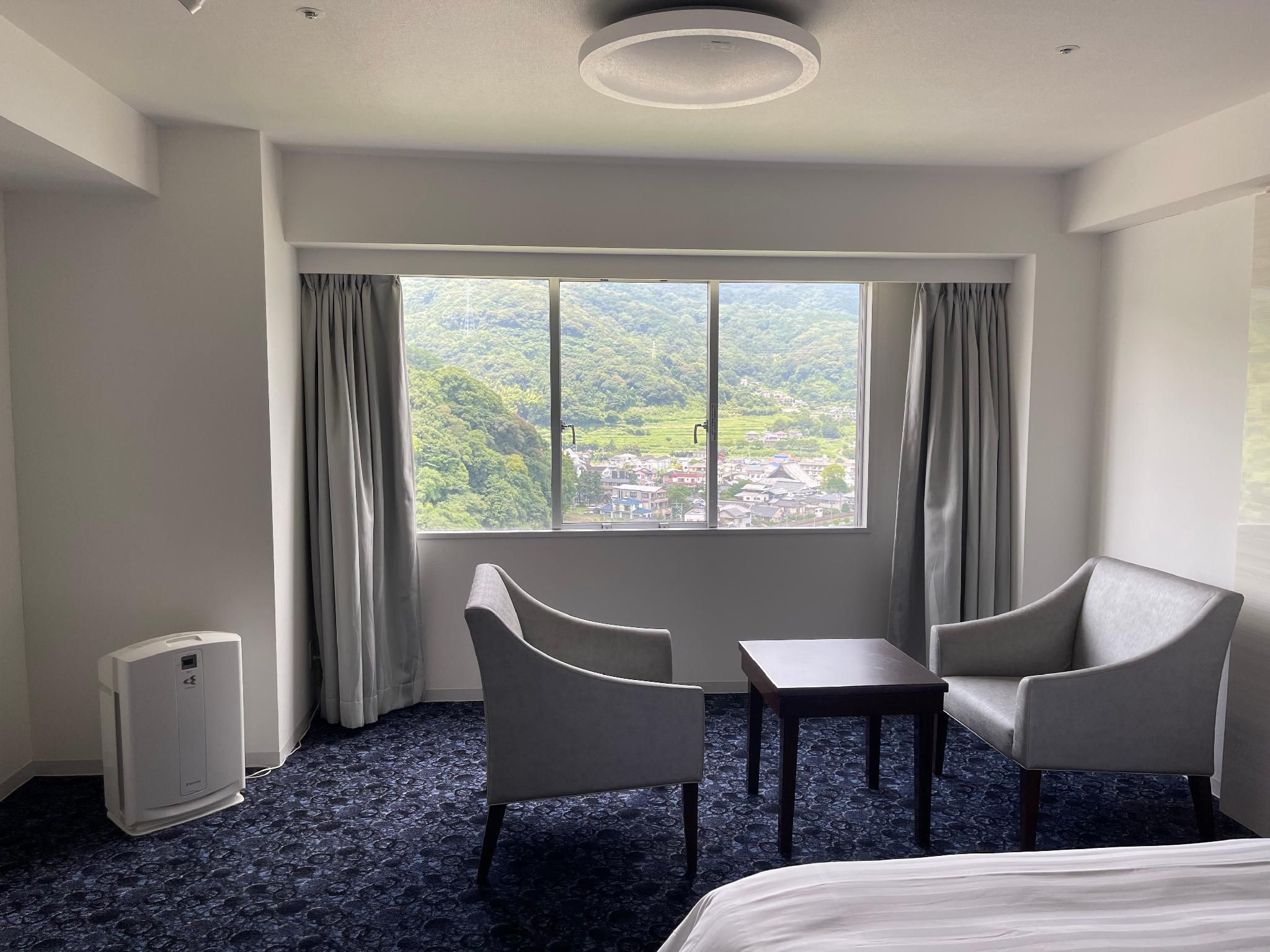 Standard Room with 2 Single Beds and 1 Sofa Bed