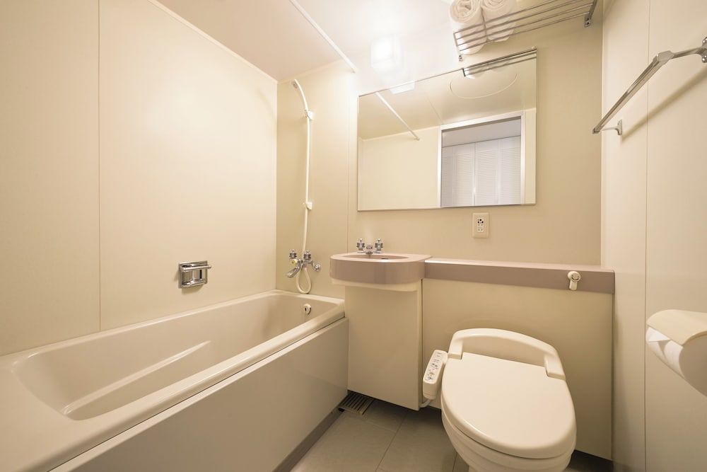 Classic Room with 2 single beds and 2 extra beds