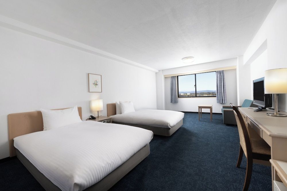 Classic Room with 2 single beds and 2 extra beds