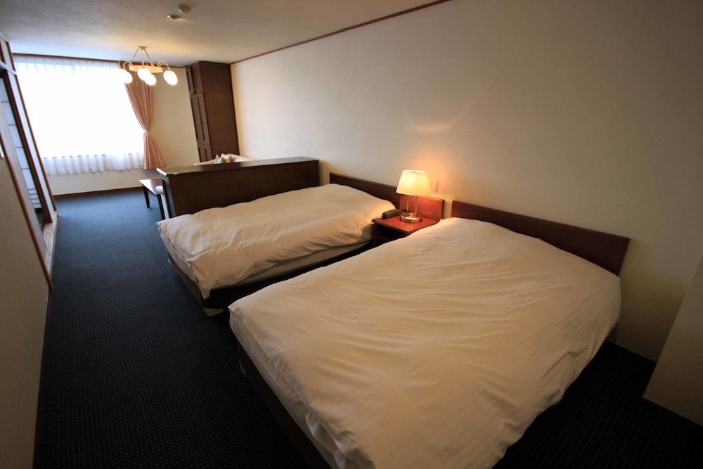 Standard Room with Tatami Area and Japanese Futon