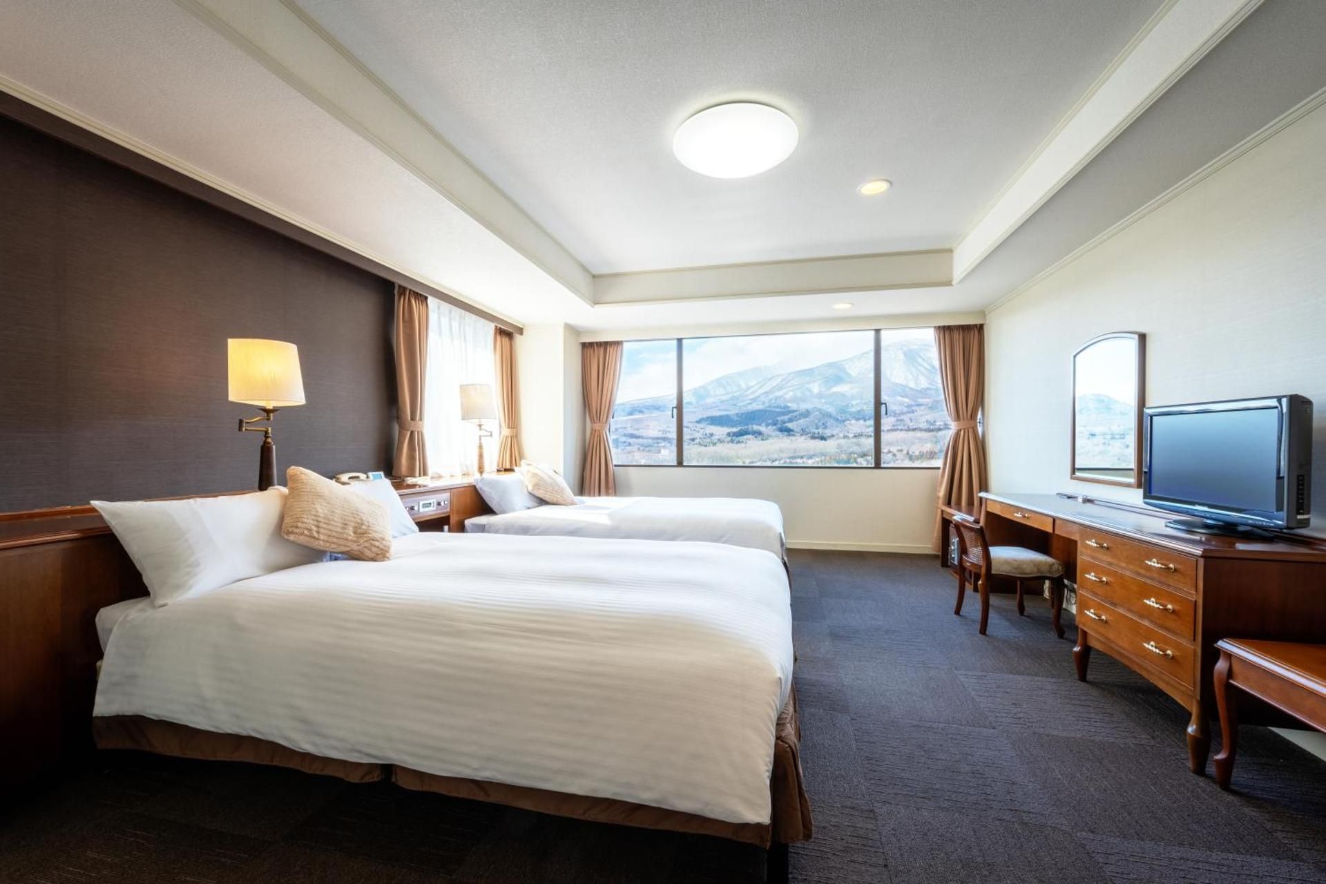 Classic Deluxe Suite with Four Single Beds and Mountain View