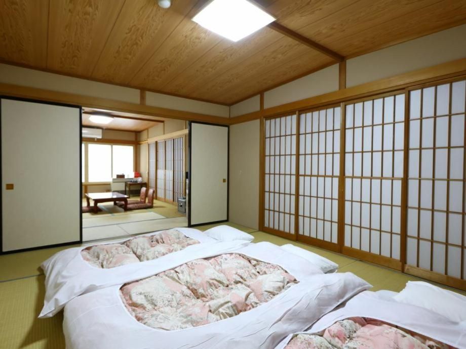 Economy Quadruple Room with Shared Bathroom