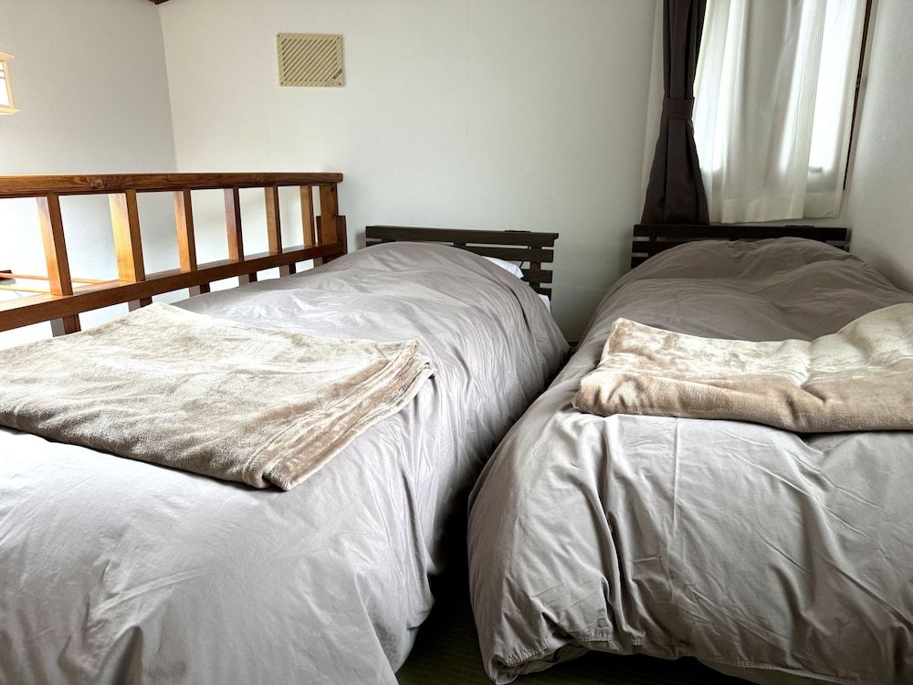 Japanese-Style Room 98 ft2 with 45 ft2 loft, Private Toilet and Private Bath( No car parking)