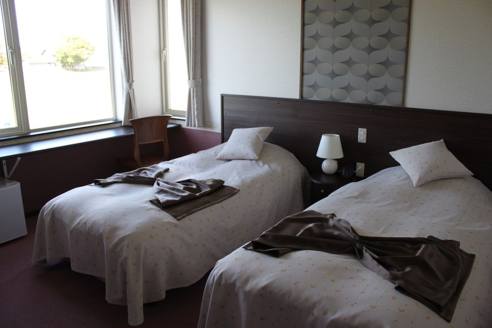 Petit Hotel Blanc Fleur Twin Room 4