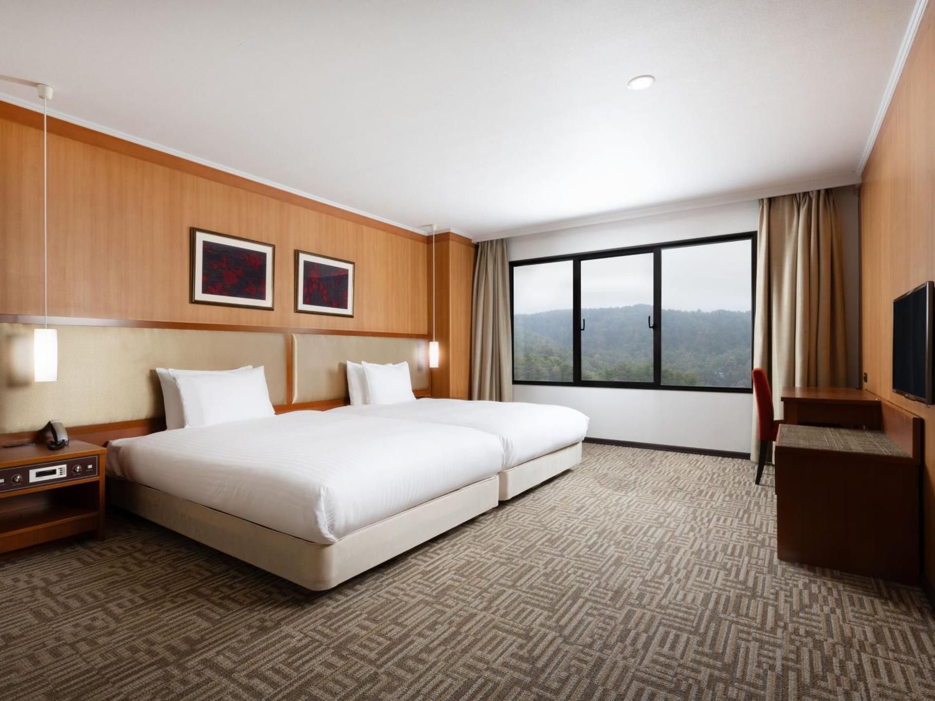Privilege Deluxe Suite with Four Single Beds and Mountain View