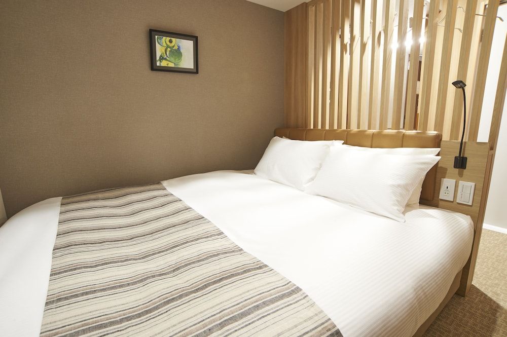 undefined Quintessa Hotel Tokyo Haneda Comic & Books 3