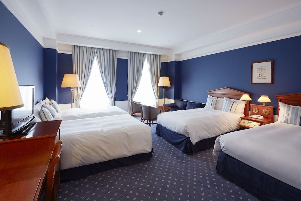 (Next day One-day pass included) Deluxe Designer Quad Room