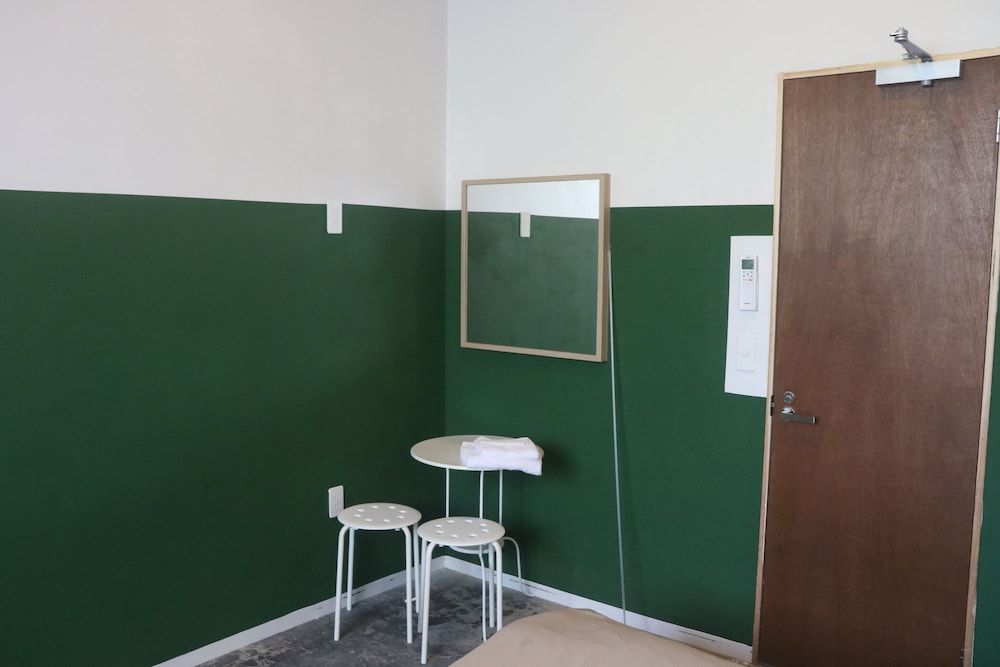 Economy Quadruple Room, 2 Double Beds, Non Smoking, Shared Bathroom