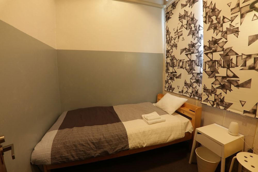 Economy Single Room, 1 Twin Bed, Non Smoking, Shared Bathroom