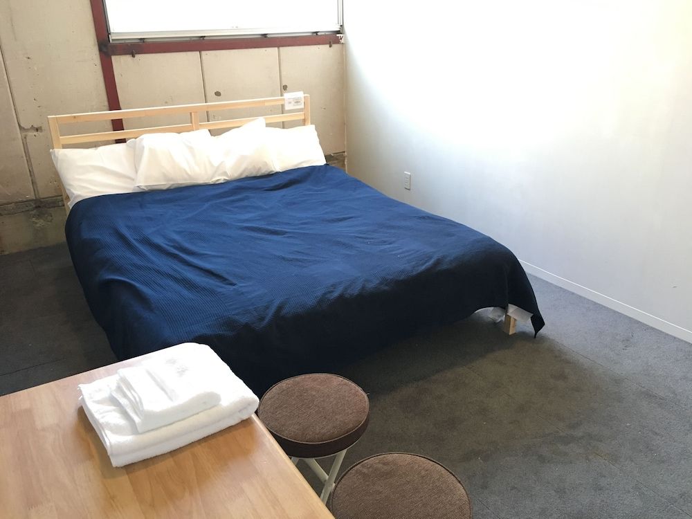 Economy Double Room, 1 Queen Bed, Non Smoking, Shared Bathroom
