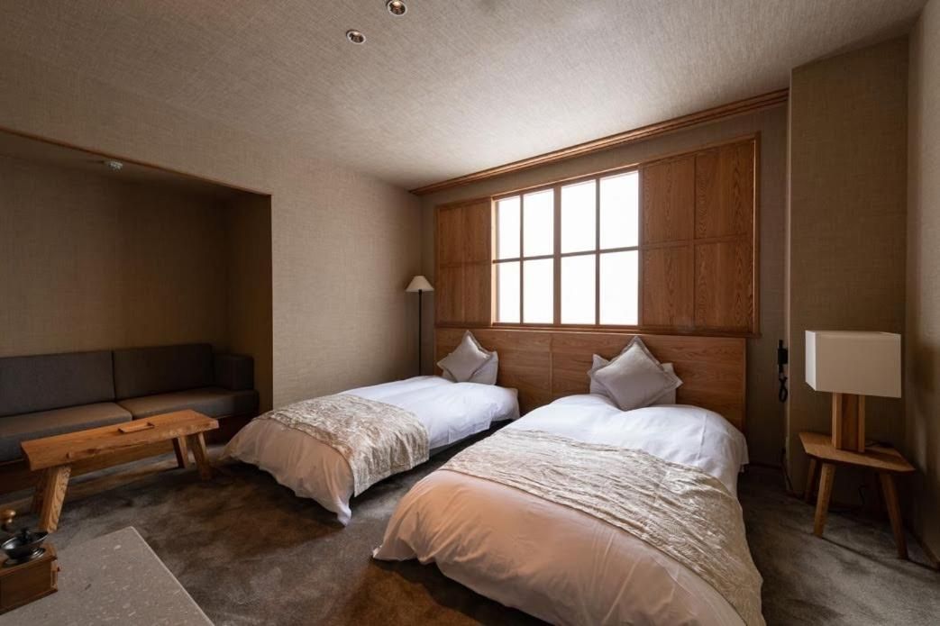 Moderate Twin Room with Shared Bathroom - Non-Smoking