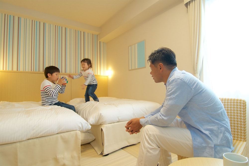 Twin Room with max 1 futon bed to match with the number of adults