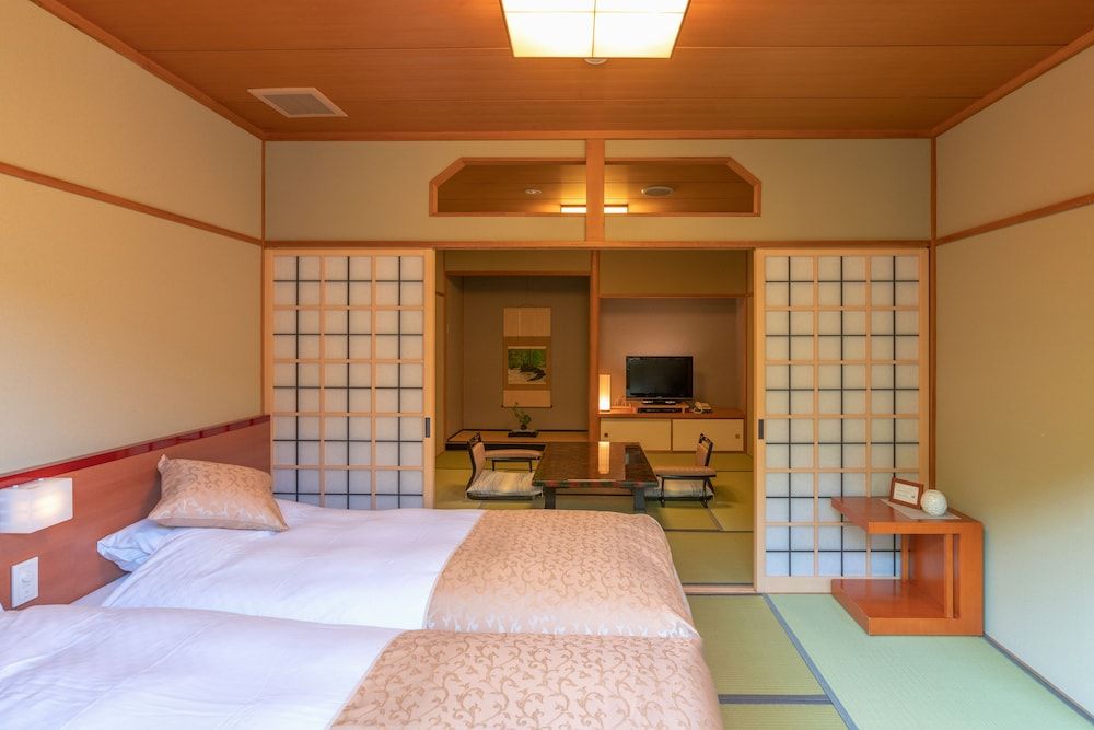 Japanese Style Room with Open-air bath and Semi Open-air bath and Garden (Second floor)