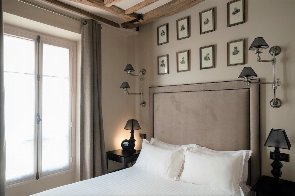 undefined Hotel Saint-Louis en L'Isle - Notre-Dame 3