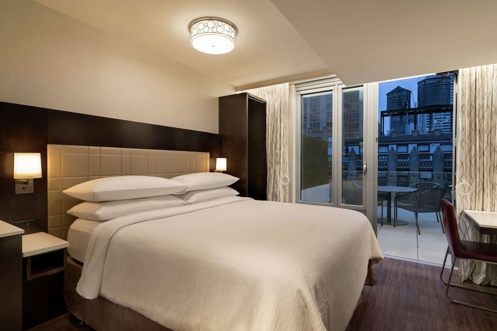 Embassy Suites by Hilton New York Manhattan Times Square 1 King City View Balcony, Hear 3x3 Shower