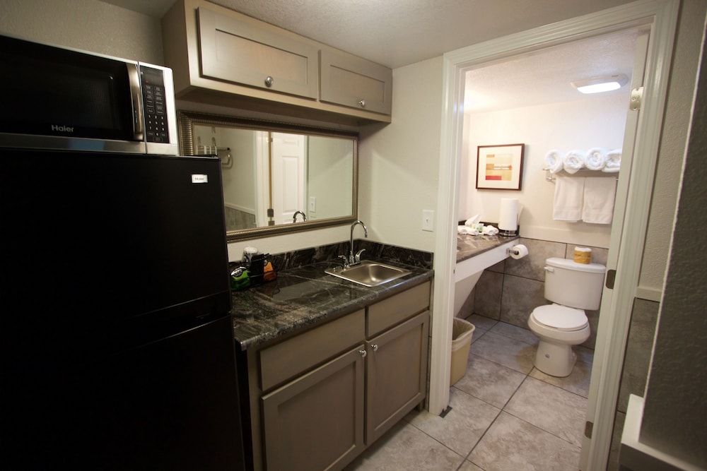 At Home Inn & Suites 2 Room Luxury Suite, 1 King & 1 Sofa Bed (Interior) 10