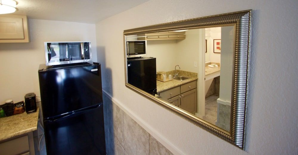 At Home Inn & Suites 2 Room Luxury Suite, 1 King & 1 Sofa Bed (Interior) 9