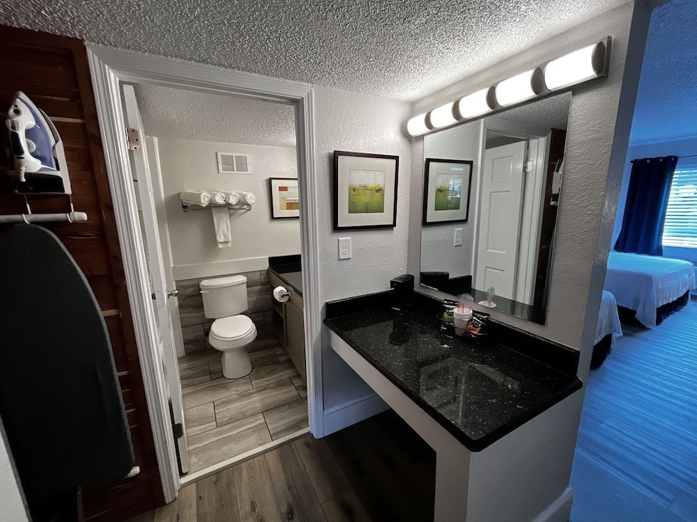 At Home Inn & Suites 2 Room Luxury Suite, 1 King & 1 Sofa Bed (Interior) 12