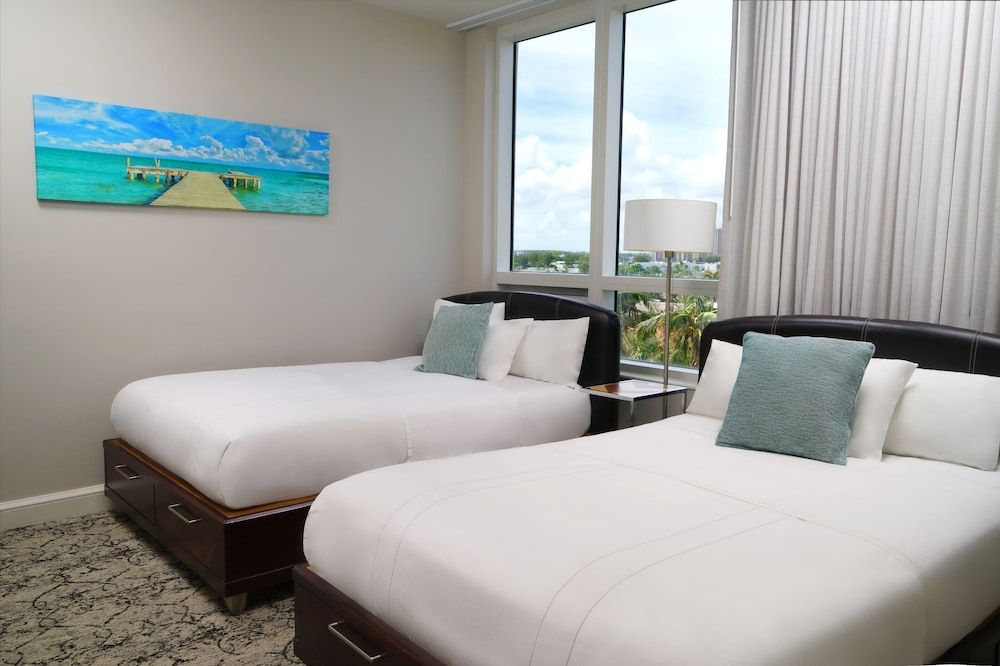 Palm Beach Singer Island Resort & Spa Luxury Suites 2 Bedroom Suite, Bedroom 1: 1 King, Bedroom 2: 2 Double, Bathrooms: 2, Intracoastal view, Balcony 2