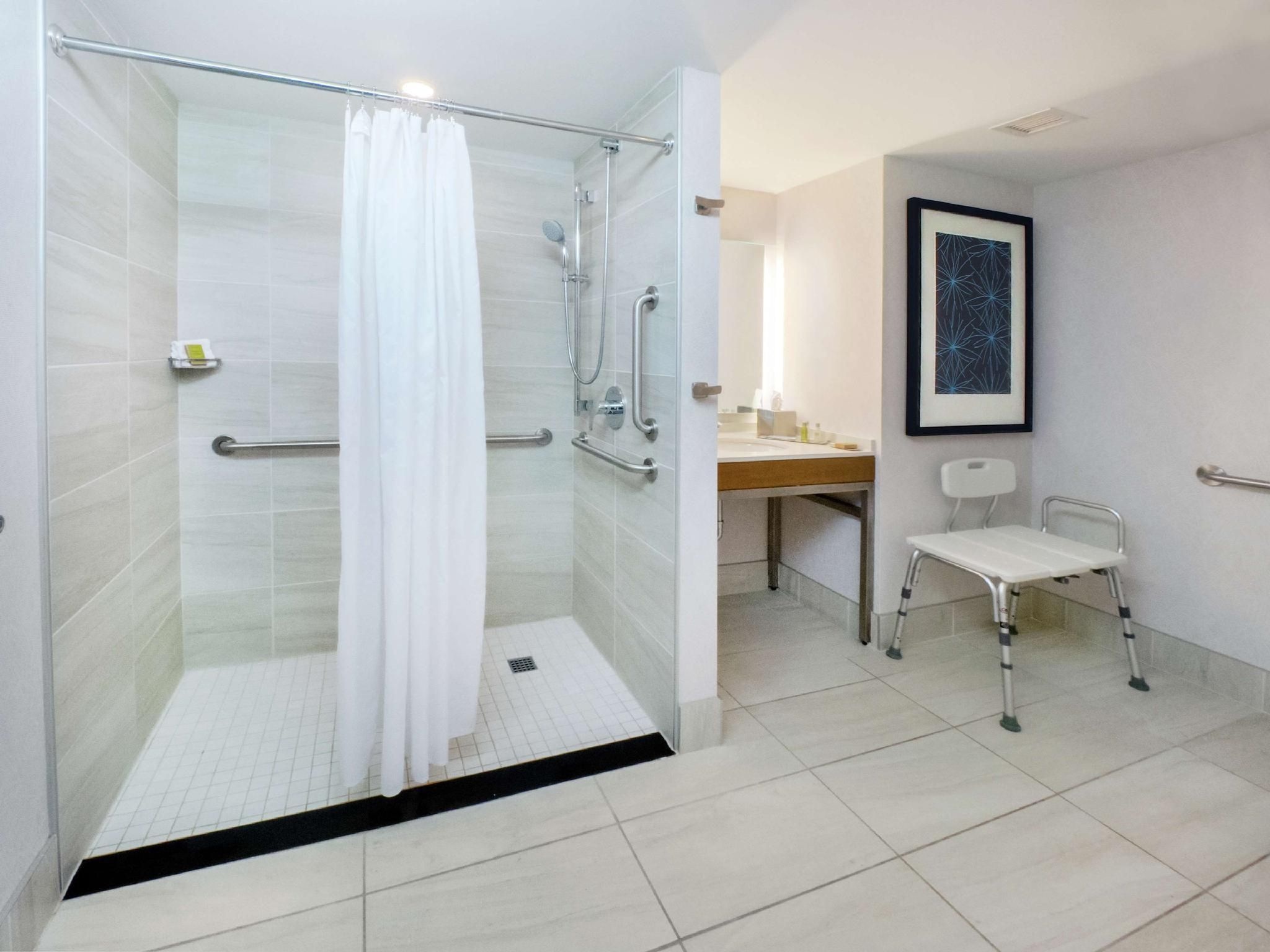 1 KING MOBILITY ACCESSIBLE ROLL IN SHOWER