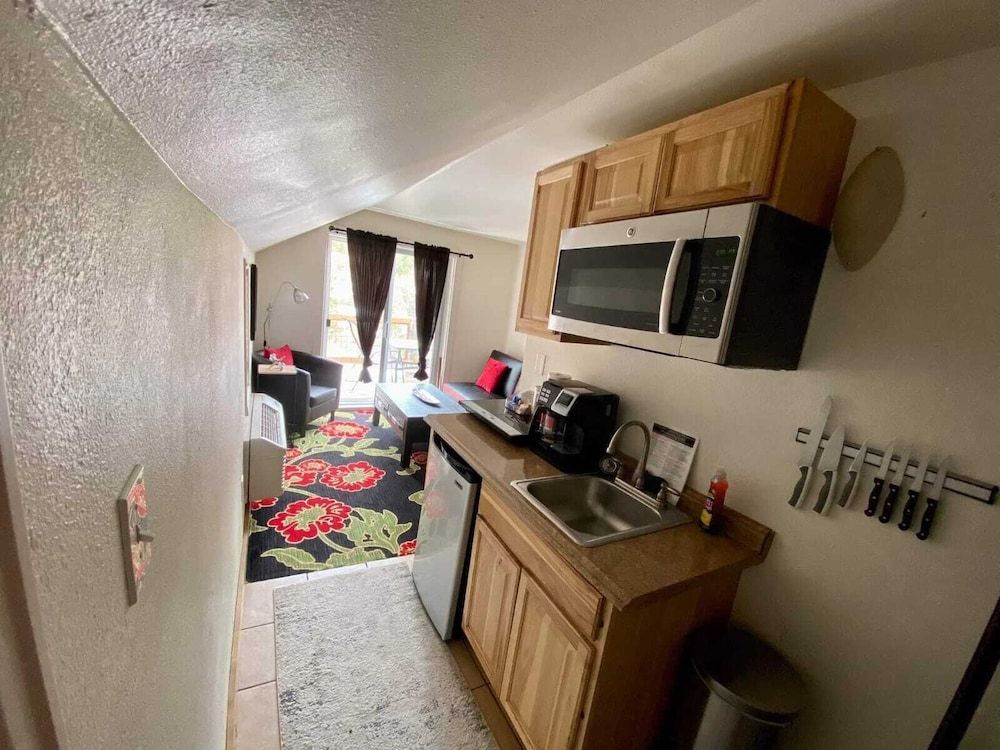 The Green Mountain Falls Lodge Mini Suite with a King Bed and Twin Sofa Sleeper 6