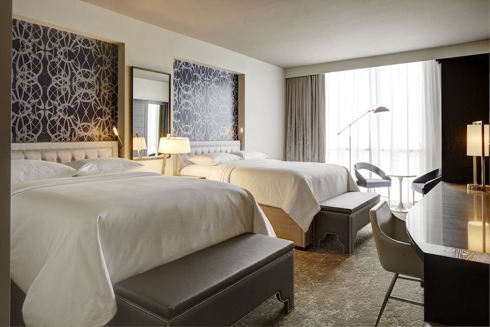 Double Queen Mobility and Hearing-Accessible Guest Room with Roll-in Shower