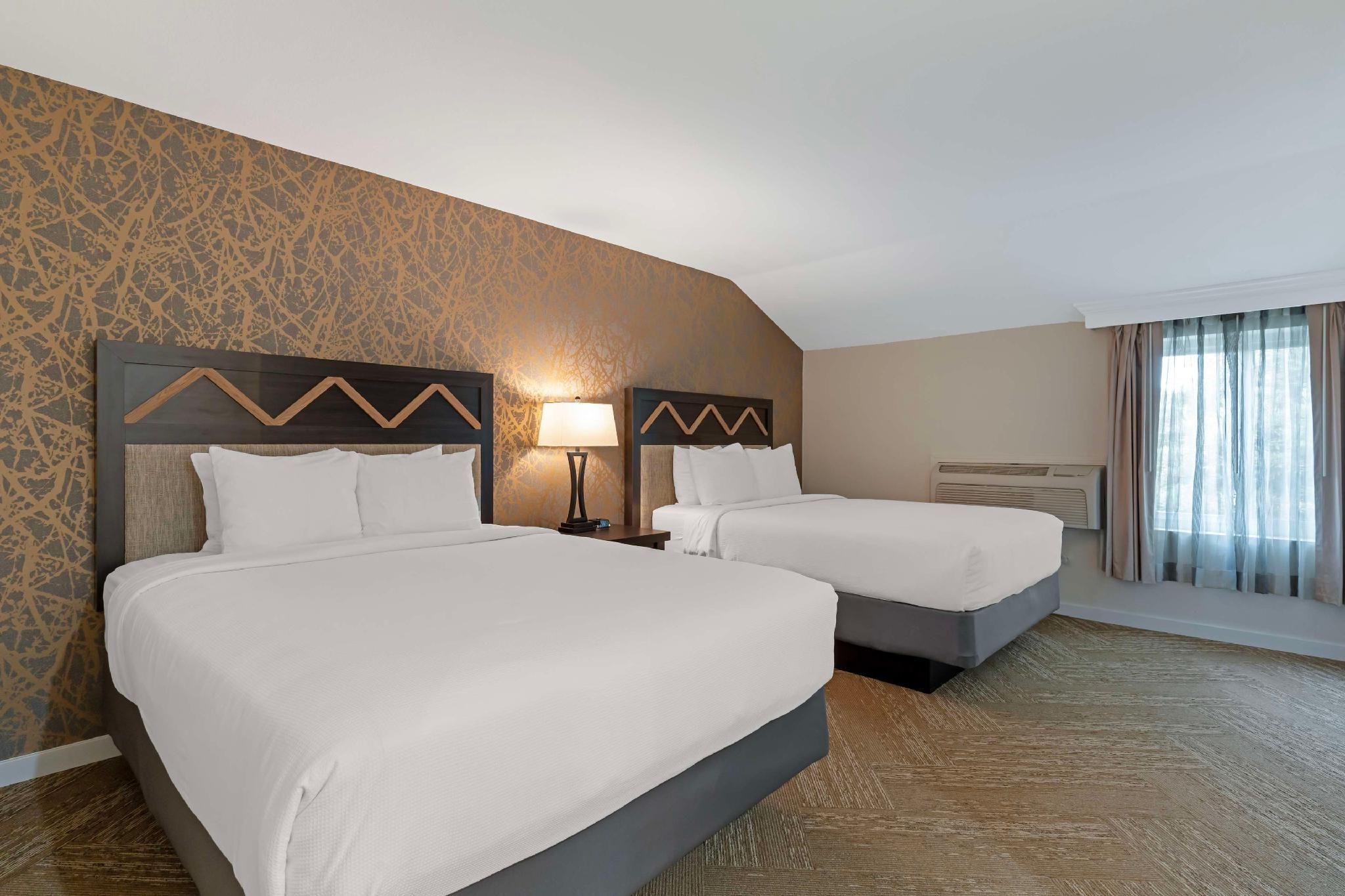 Suite - 2 Queen Beds, Nonsmoking, Sofabed, Living Room, Walk-in Shower