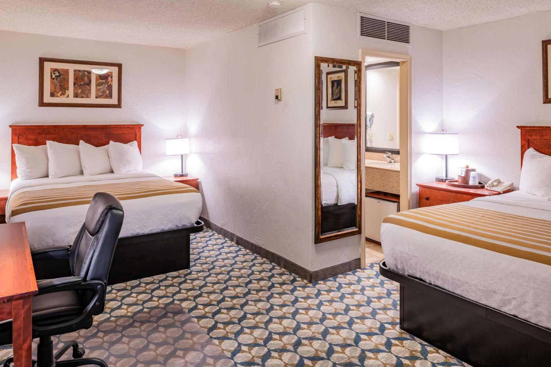 2 Queen Beds, Non-Smoking, High Speed Internet Access, Refrigerator, Flat Screen Television, Pillowt