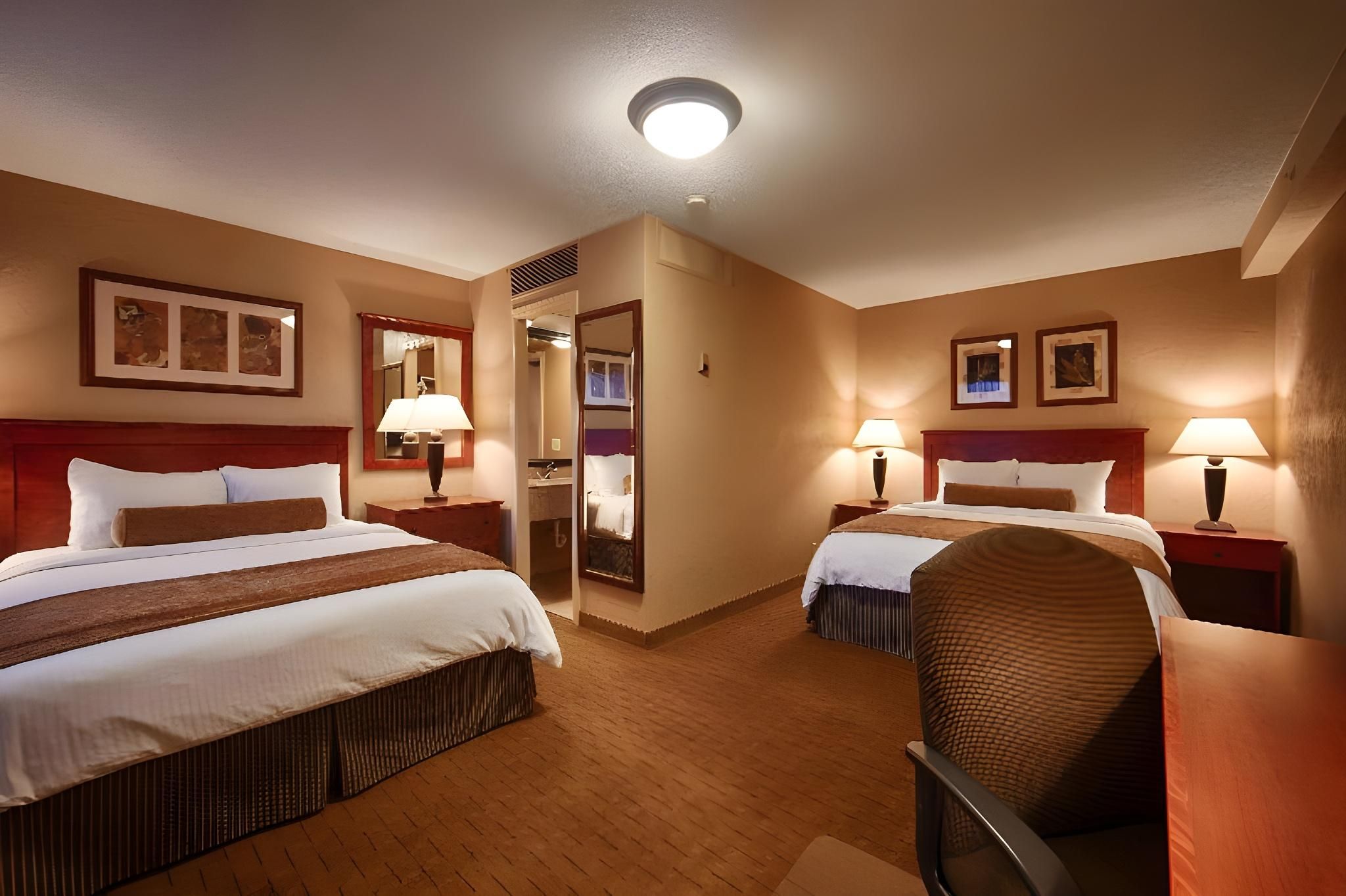 2 Queen Beds, Non-Smoking, High Speed Internet Access, Refrigerator, Flat Screen Television, Pillowt