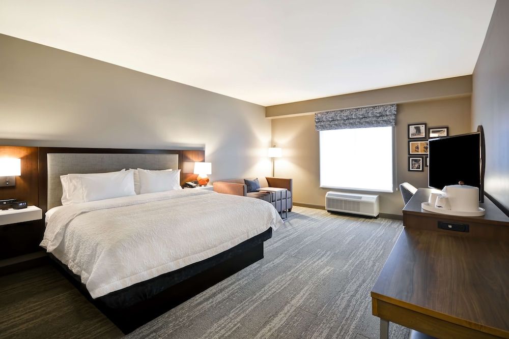 Room, 1 King Bed with Sofa bed, Refrigerator & Microwave