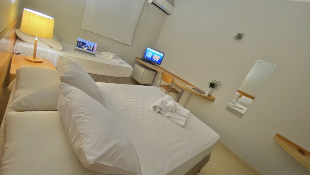 Triple Room (Casal + 1)