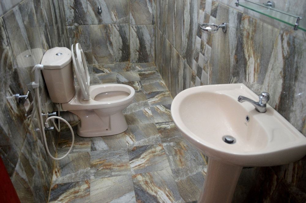 Shyni Tourist Guesthouse Deluxe Double Room, Garden View, Beachside 3