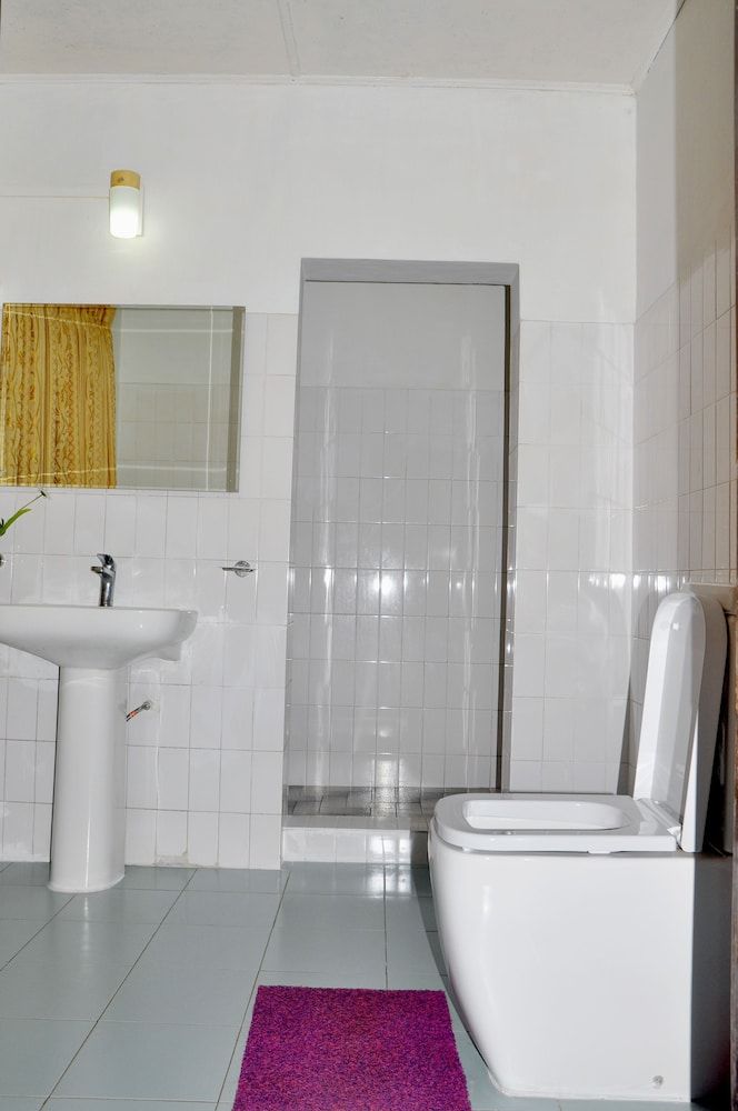 Chelthnam Bungalow Deluxe Triple Room 4