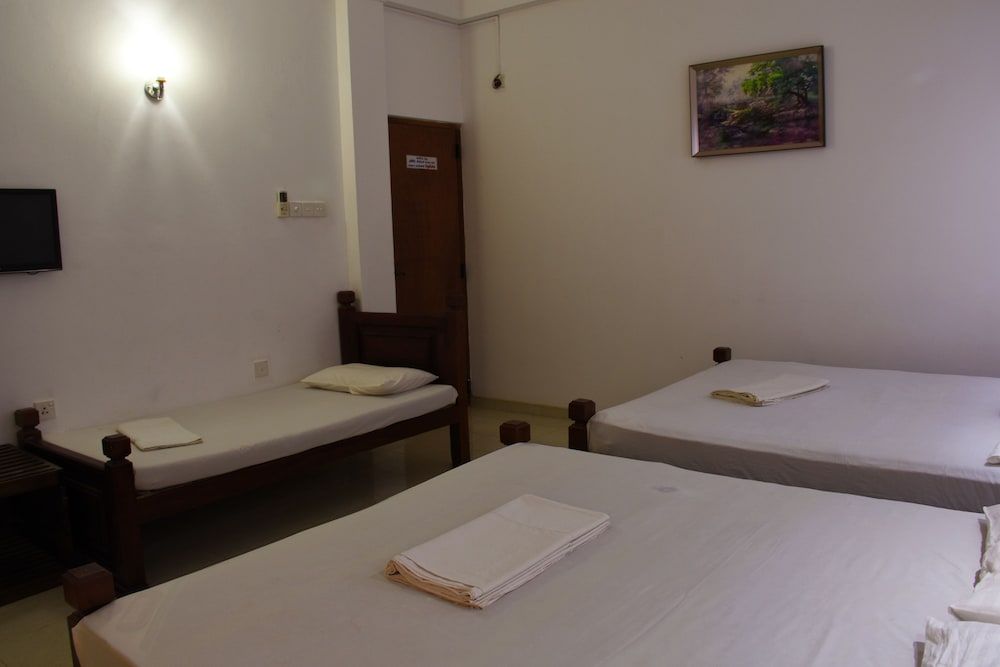 Standard Quadruple Room, Multiple Beds, Non Smoking, Garden View