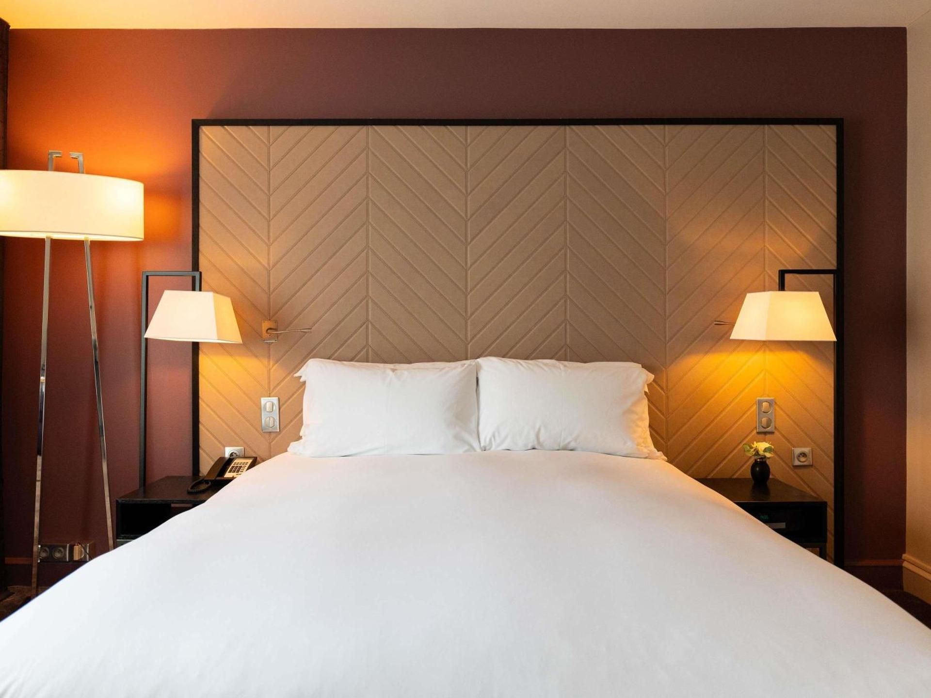 Family Room with a Queen Bed and Two Single Beds