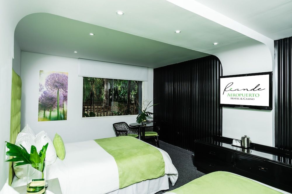 Riande Aeropuerto Hotel & Casino Room, 2 Double Beds, Pool Access, Pool View 8