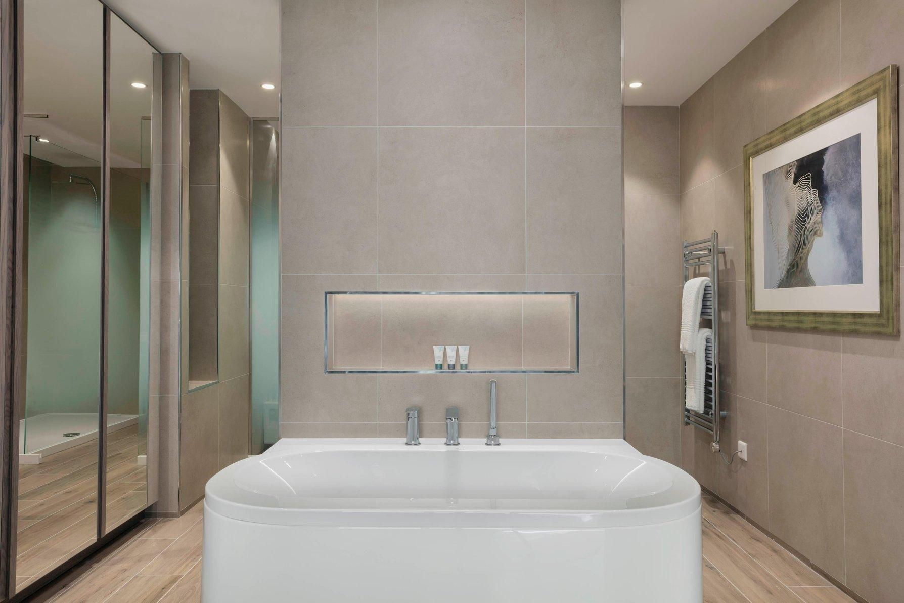 Premium Suite, 1 Bedroom Larger Suite, 1 King, Sofa bed, Garden view, Balcony