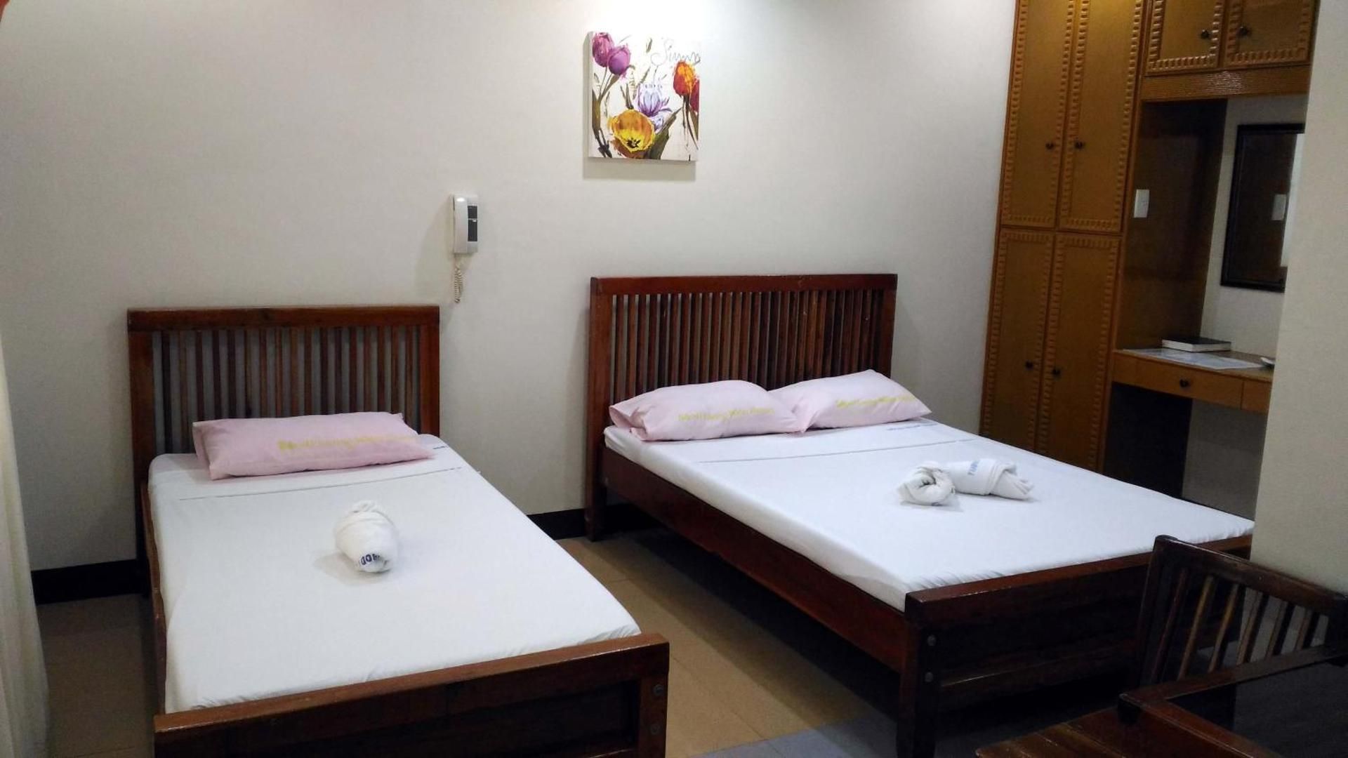 Tubod Flowing Waters Resort Deluxe Triple Room