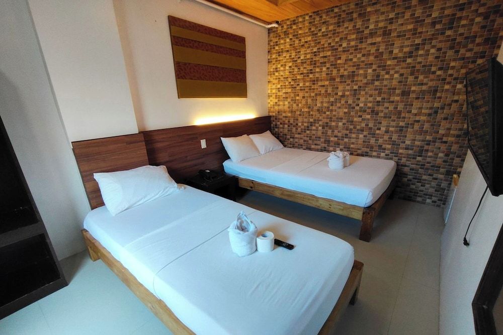 Taj Guesthouse Boracay Triple Room 3