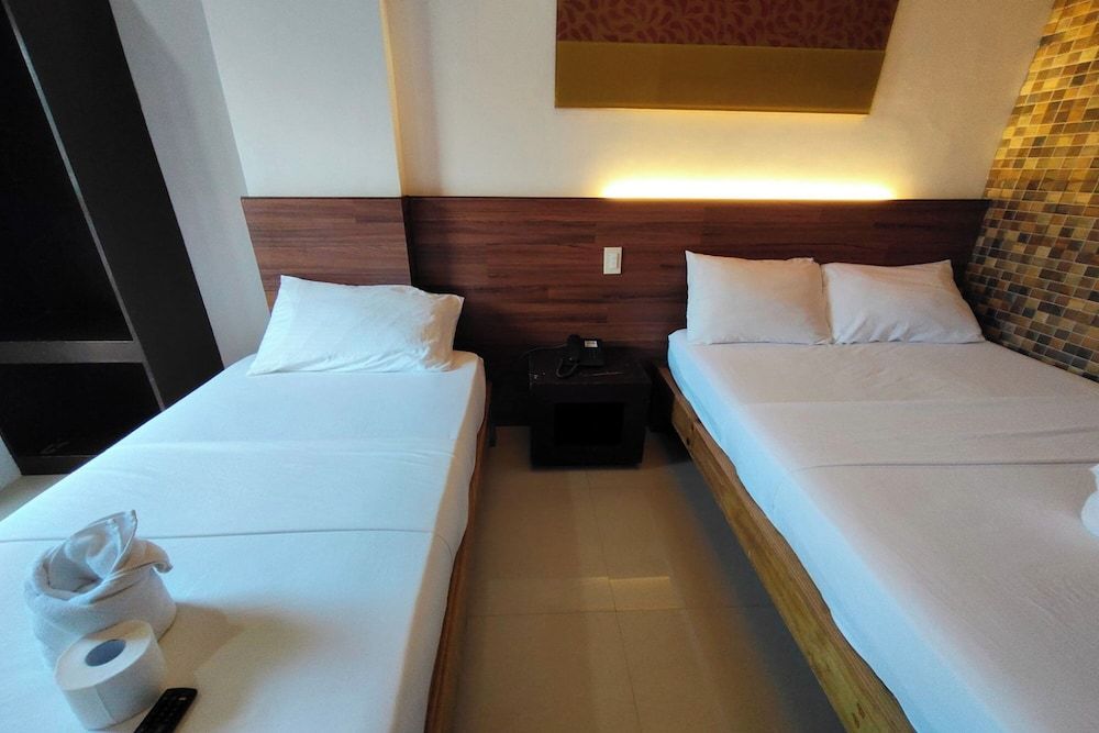 Taj Guesthouse Boracay Triple Room 6