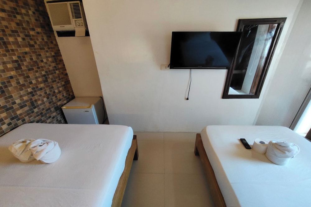 Taj Guesthouse Boracay Triple Room 9