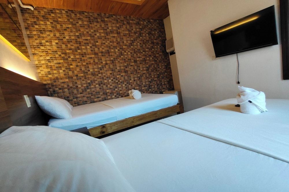 Taj Guesthouse Boracay Triple Room 4