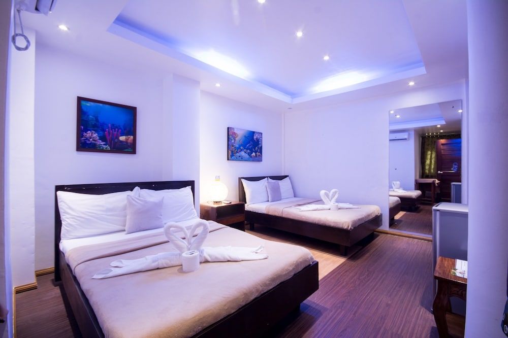 Deparis Beach Resort Deluxe Room (Interior Quad) 2