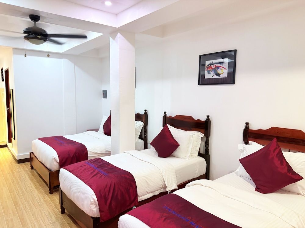 Doublegem Beach Resort and Hotel Oceanview Family Room 1 Queen and 2 Single Beds 3