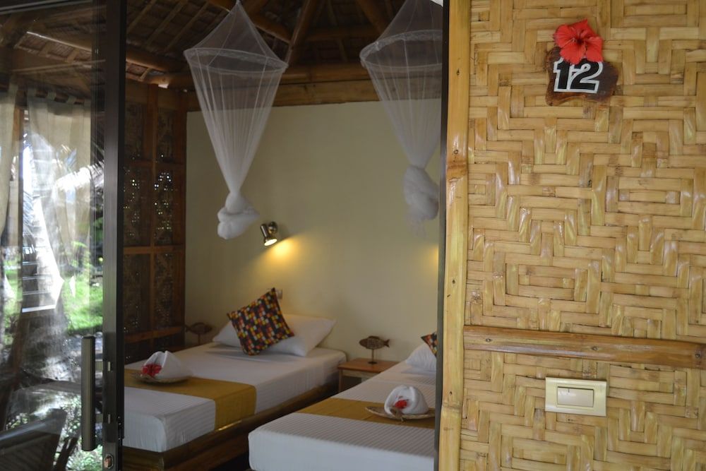 Camiguin Volcan Beach Eco Retreat & Dive Resort Romantic Cottage, Beach View, Beachside 2
